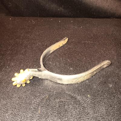 METAL AND RUBBER SPURS