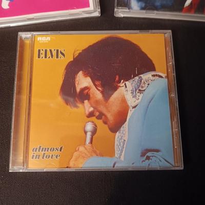 ELVIS TREASURES COFFEE TABLE BOOK AND 3 MUSIC ON CD'S