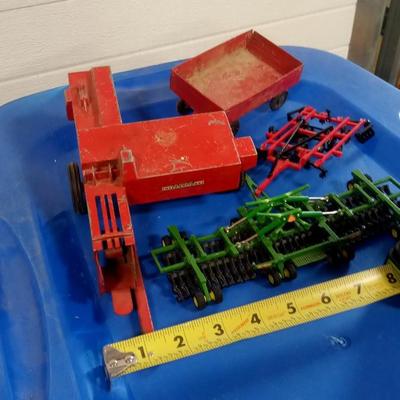 LOT 175 FOUR TOY PIECES OF FARM EQUIPMENT