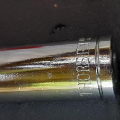 Nice Thorsen socket set with metal storage box and three lady foot rolling head pry bars
