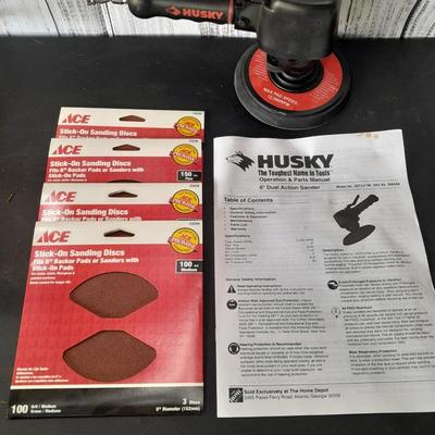 Brand new Husky 6" Dual Action Sander with instructions and brand-new sanding discs