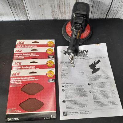Brand new Husky 6" Dual Action Sander with instructions and brand-new sanding discs