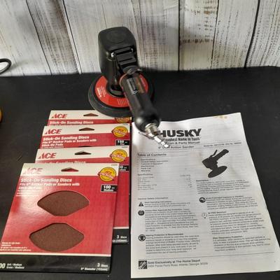 Brand new Husky 6" Dual Action Sander with instructions and brand-new sanding discs