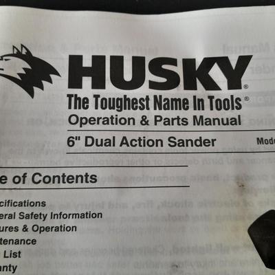 Brand new Husky 6" Dual Action Sander with instructions and brand-new sanding discs