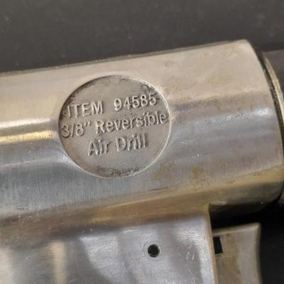 like new - Central Pneumatic 3/8" Reversible air drill with instruction book