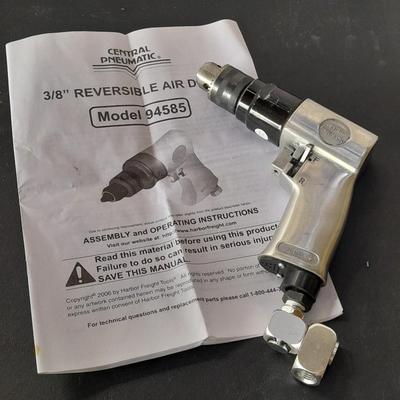 like new - Central Pneumatic 3/8" Reversible air drill with instruction book