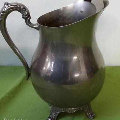 Vintage claw foot silver water pitcher with ice catcher, by F B Rogers 