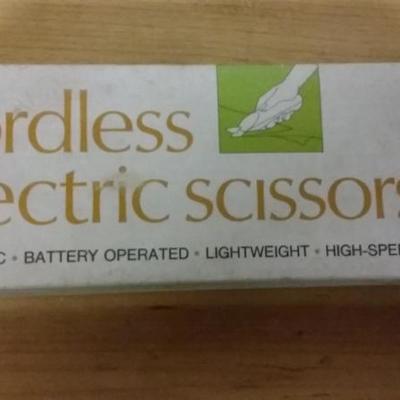 Vintage cordless electric scissors by Charter supply corp