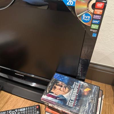 Brand new 26 inch Magnavox television with DVD player a lot of DVDs