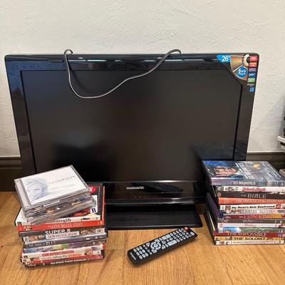 Brand new 26 inch Magnavox television with DVD player a lot of DVDs