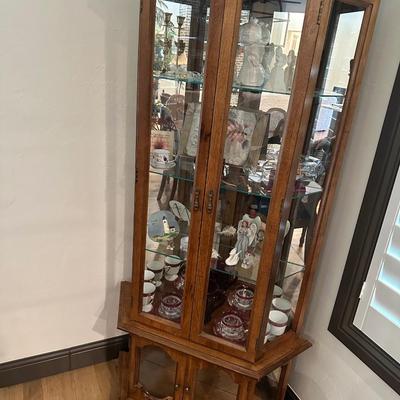 Corner curio cabinet with all knickknacks included