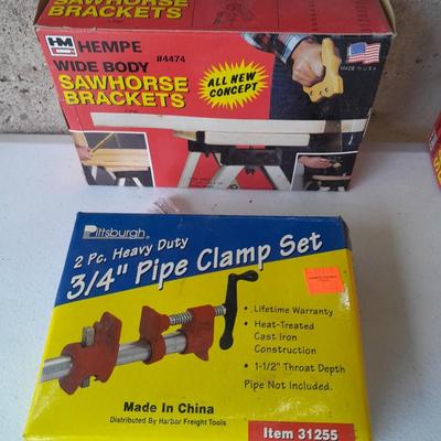 Brand new Sawhorse brackets and 3/4" Pipe clamp set