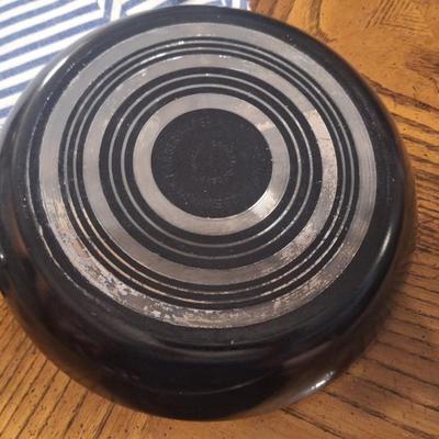 3 skillets and a pot holder set