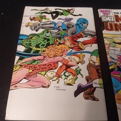2 MARVEL UNIVERSE COMIC BOOKS