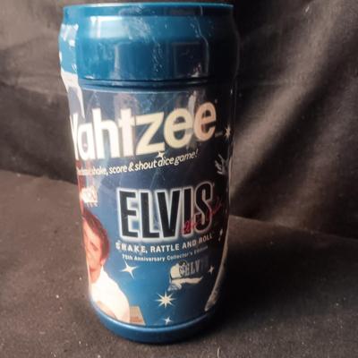 ELVIS YAHTZEE GAME AND A MAGNETIC MIX & MATCH ACTIVITY BOARD
