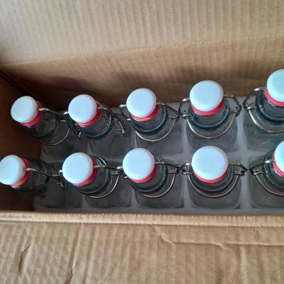 New set of ten Zebeiyu 4-ounce glass bottles with swing top lids - Preppers Delight!