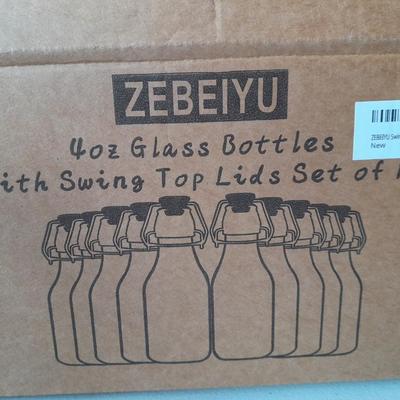 New set of ten Zebeiyu 4-ounce glass bottles with swing top lids - Preppers Delight!