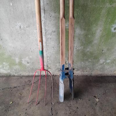 Nice older Pitchfork and a pair of wood handled post hole diggers