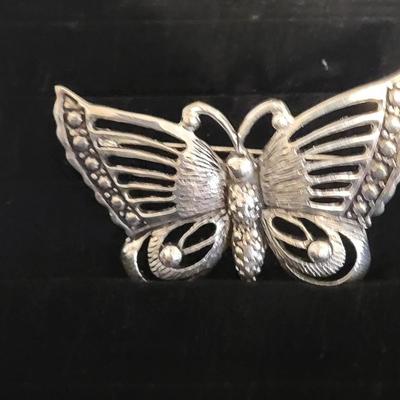 SILVER TONE BRACELETS, BROOCH, EARRINGS AND ROCK BAND 'KISS" NECKLACE