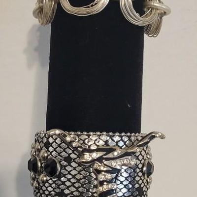 SILVER TONE BRACELETS, BROOCH, EARRINGS AND ROCK BAND 'KISS" NECKLACE