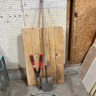Shovel, saw and clippers