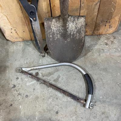 Shovel, saw and clippers