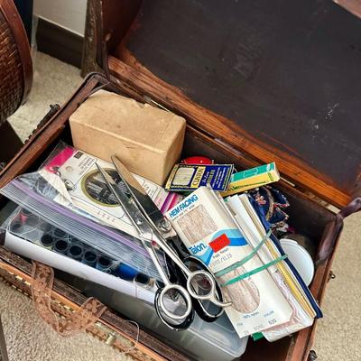 Lot of various frames and 2 trunks. Filled with sewing supplies and fabric scraps.