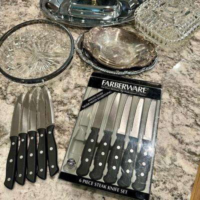 Lot of steak knives and glass and silver-plate dishes