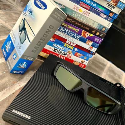 Lot Blue Ray Discs and a Samsung Blueray Player and 2 pair of 3D glasses