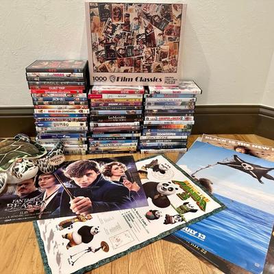 Lot of DVDs (all included in photo) also movie posters and a stuffed turtle