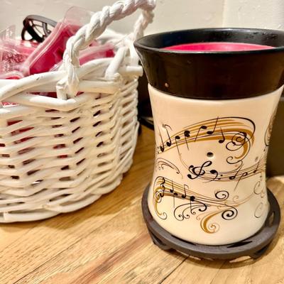 2 Red pillows, home decor and a Scentsy warmer with a basket full of melts