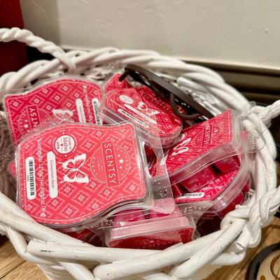 2 Red pillows, home decor and a Scentsy warmer with a basket full of melts