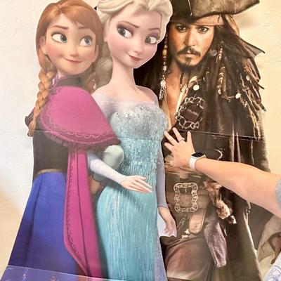 24" Westinghouse TV (like new) and 2 cardboard cut outs of Johnny Depp and Frozen over 6ft.