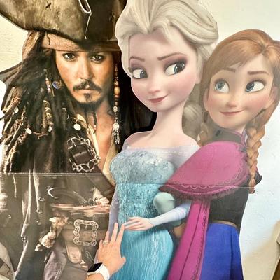 24" Westinghouse TV (like new) and 2 cardboard cut outs of Johnny Depp and Frozen over 6ft.