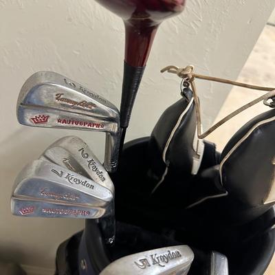 Golf Clubs &Fishing Poles (Rods and Reels), Brand new electric knife, Golf bag and more!!