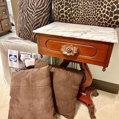 Darling antique wooden/marble top side table with pillows and King Comforter