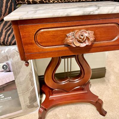 Darling antique wooden/marble top side table with pillows and King Comforter