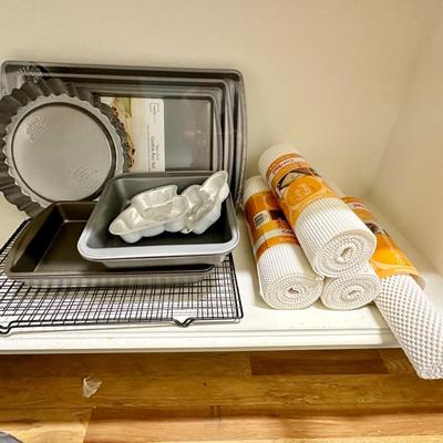 Baking pans (some brand new) / Shelf liner