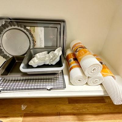 Baking pans (some brand new) / Shelf liner
