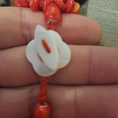Multi-strand beaded red necklace possibly coral