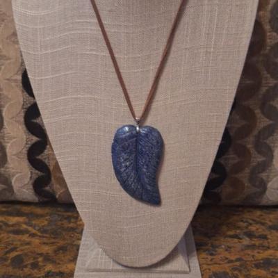 Blue stone carved leaf pendant on leather strap necklace