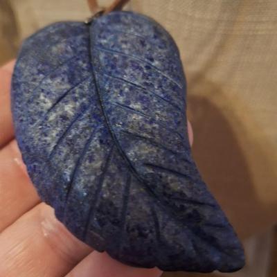 Blue stone carved leaf pendant on leather strap necklace