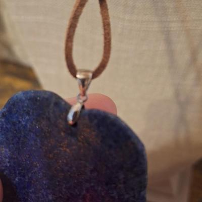 Blue stone carved leaf pendant on leather strap necklace