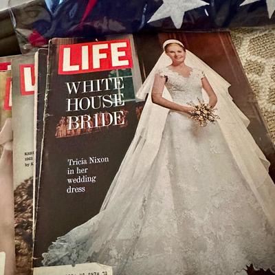 A Stack of Vintage LIFE Magazines and an American Flag