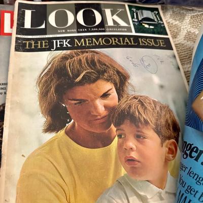 A Stack of Vintage LIFE Magazines and an American Flag