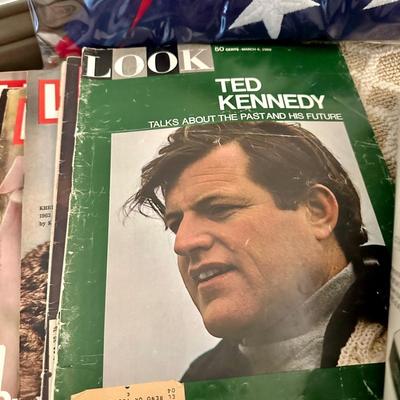 A Stack of Vintage LIFE Magazines and an American Flag