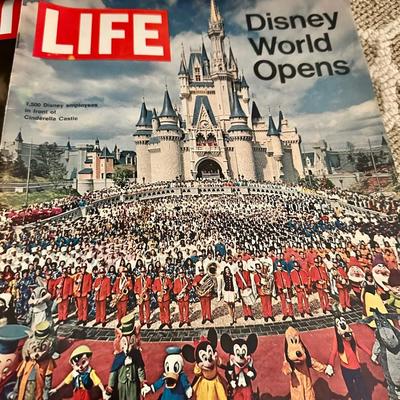 A Stack of Vintage LIFE Magazines and an American Flag