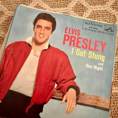 Vintage Elvis Presley 45 Records with covers