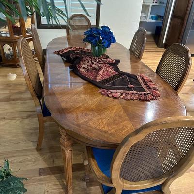 Beautiful Dining Room Table with 6 Chairs and 2 leaves and decor on top