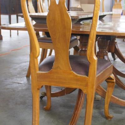 Regency crossbanded mahogany triple pedestal dining table + 8 chairs